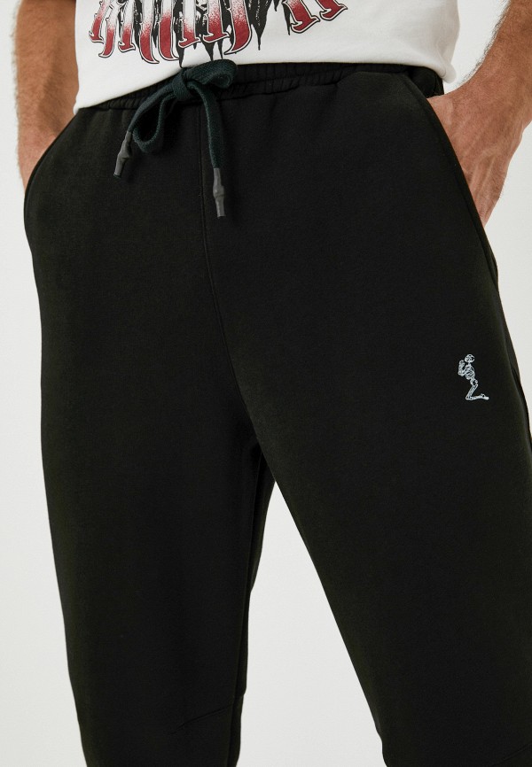 фото Брюки спортивные religion