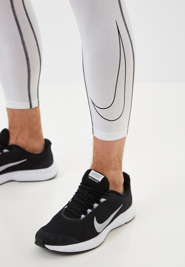 фото Тайтсы nike
