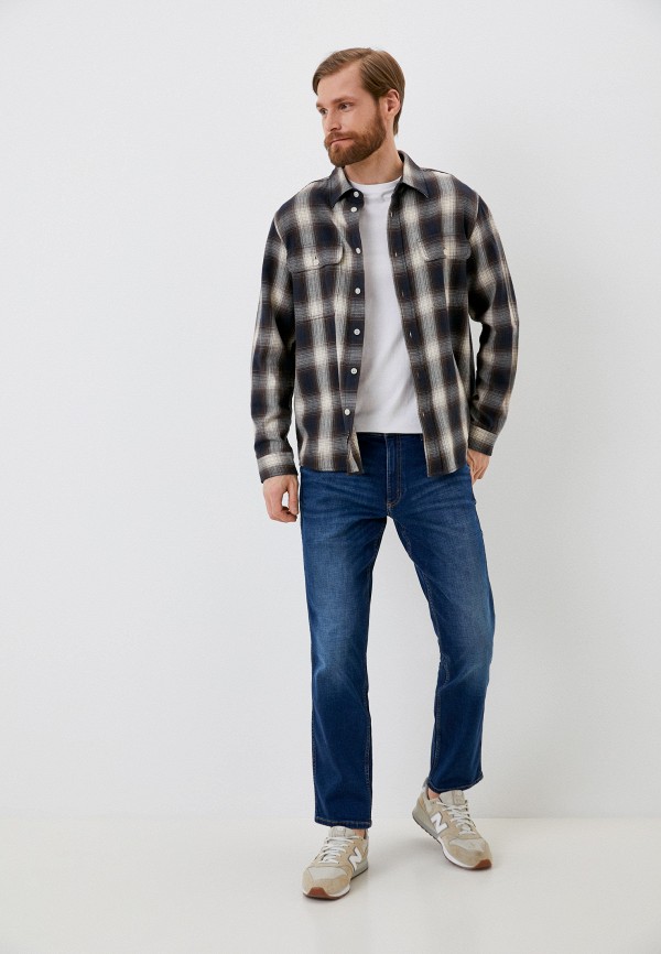 фото Джинсы wrangler