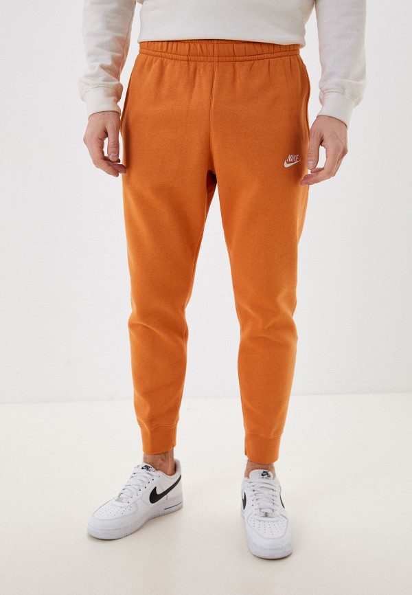 Брюки спортивные Nike оранжевого цвета