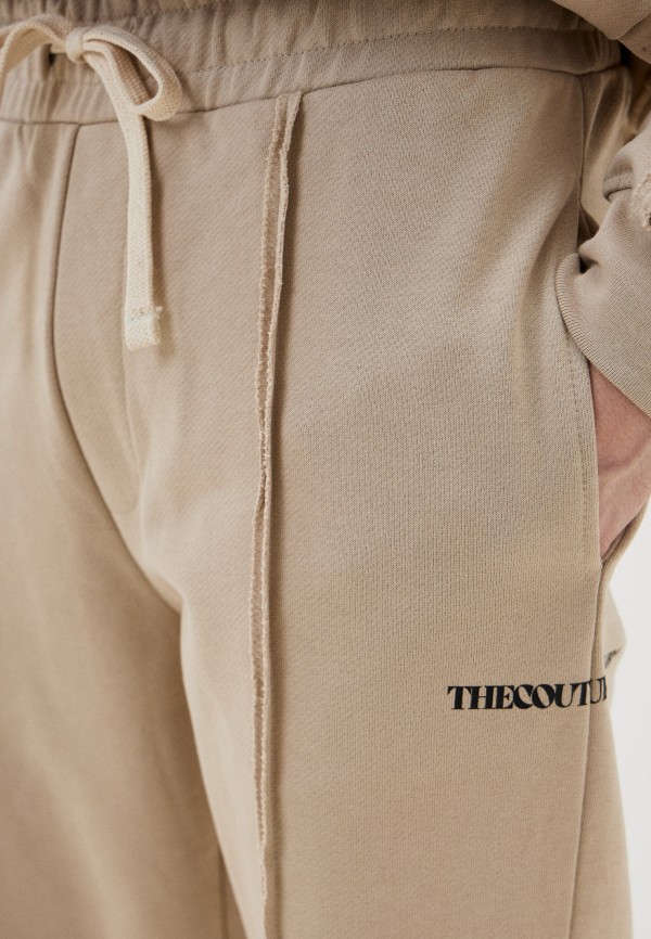 фото Брюки спортивные the couture club