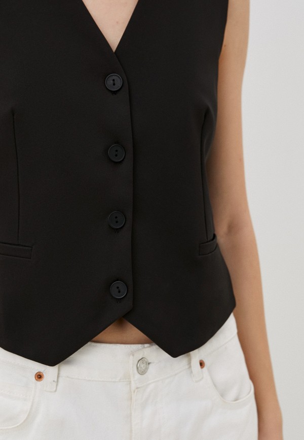 фото Жилет denote