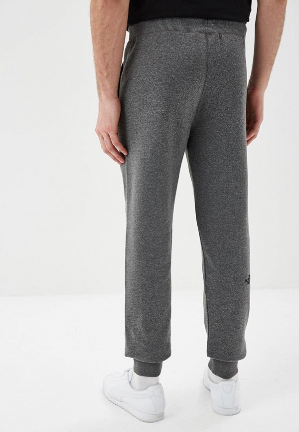 Спортивные брюки отзывы. Серые спортивные штаны the North face. The North face штаны серые. Норт фейс спортивные штаны серые. Брюки спортивные от the face серые.