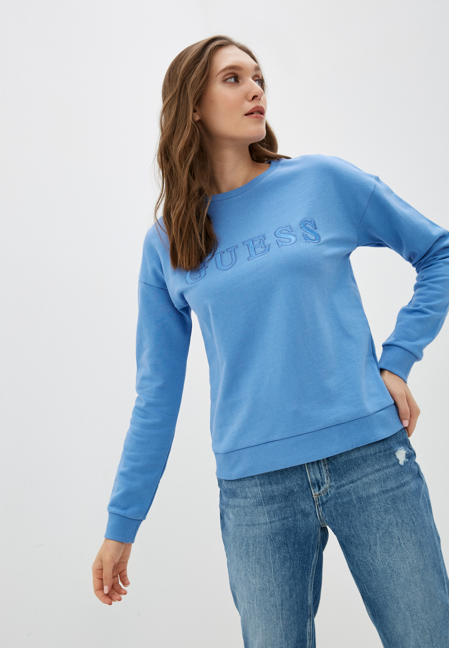 sweater tied around neck