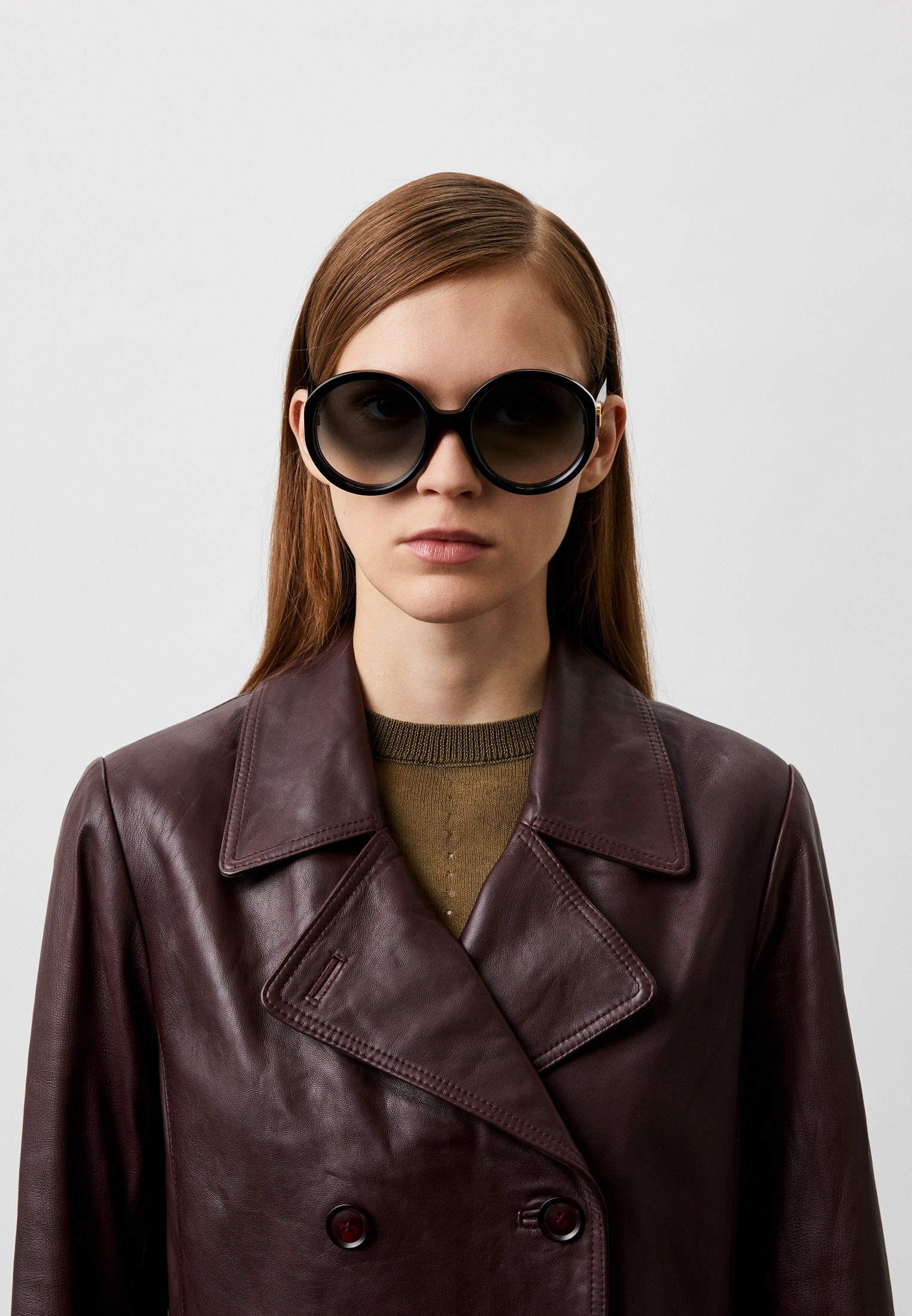 Женские солнцезащитные очки Gucci (Гуччи) GG1256S купить за 32640 руб.