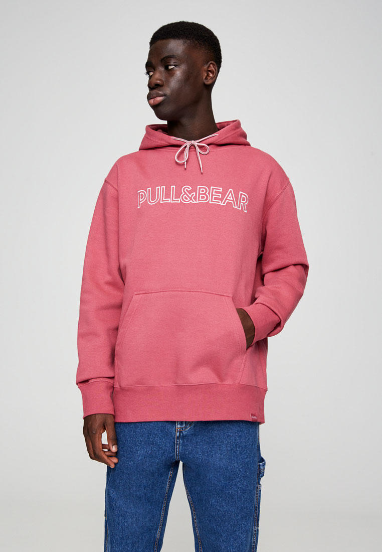 Pink hoodie pull and bear hotsell