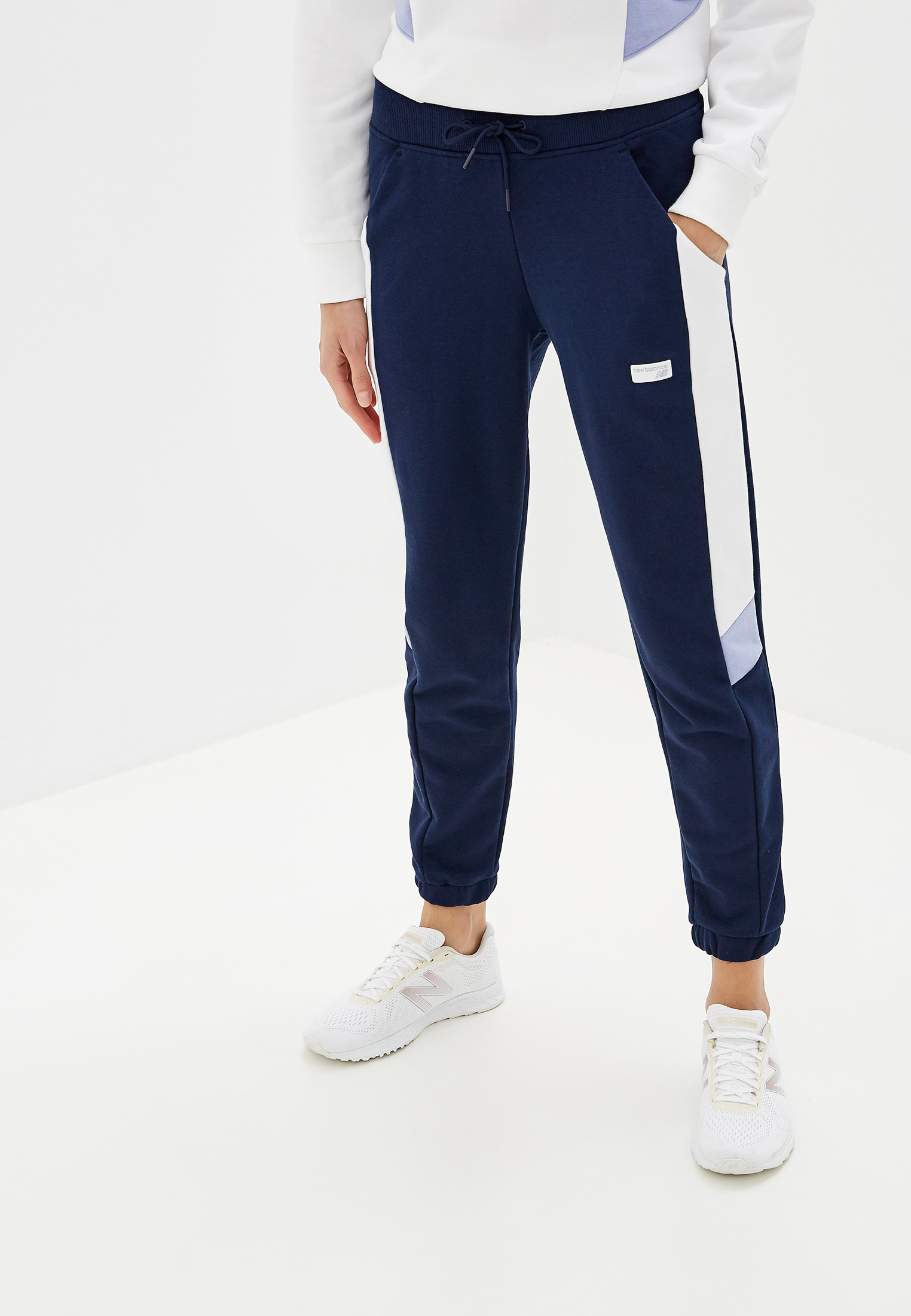 Спорт нова отзывы. Брюки New Balance. Спортивные штаны New Balance женские. New Balance брюки 13501 женский. Костюм New Balance женский.