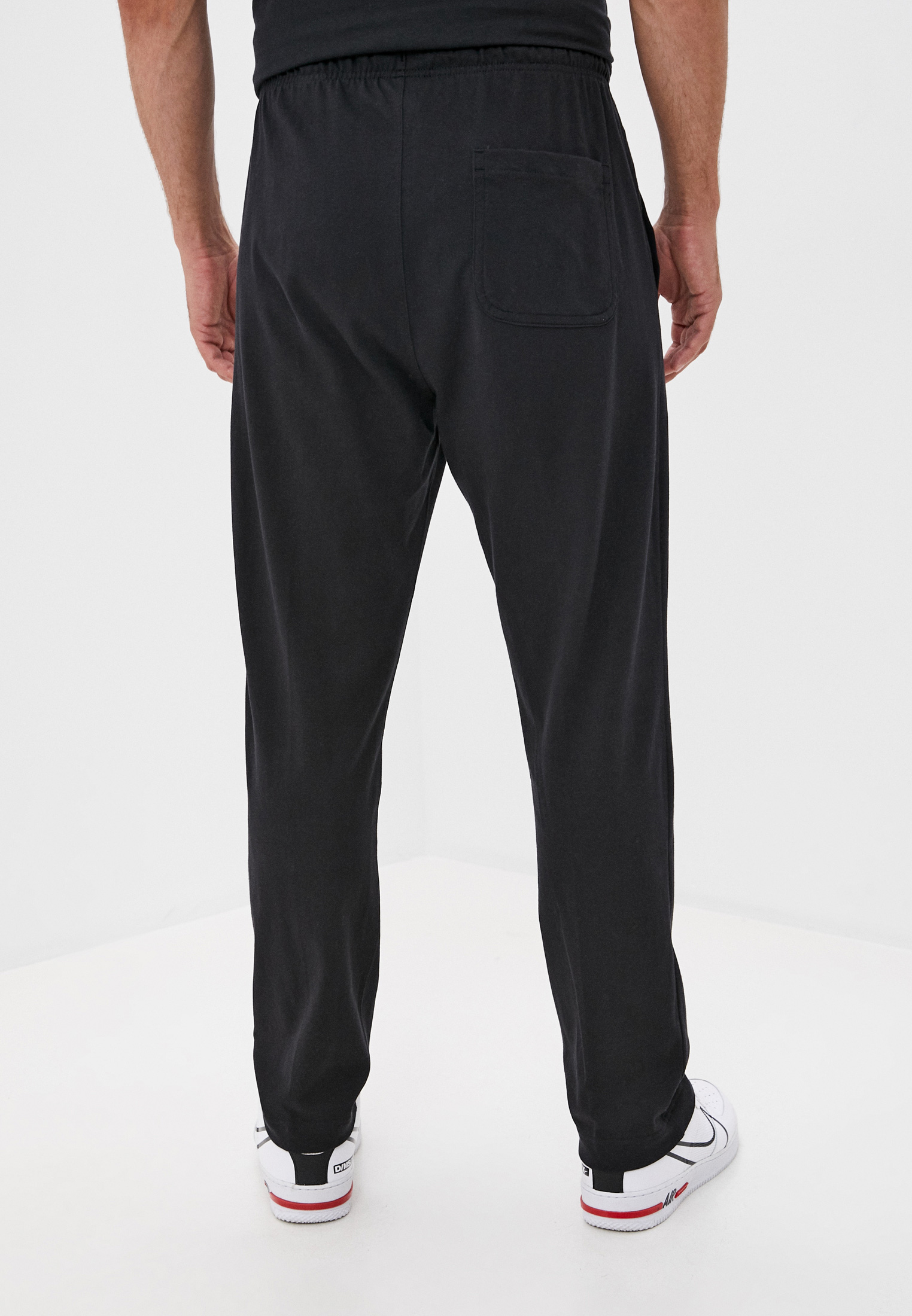 Nike sportswear club jersey pants hotsell