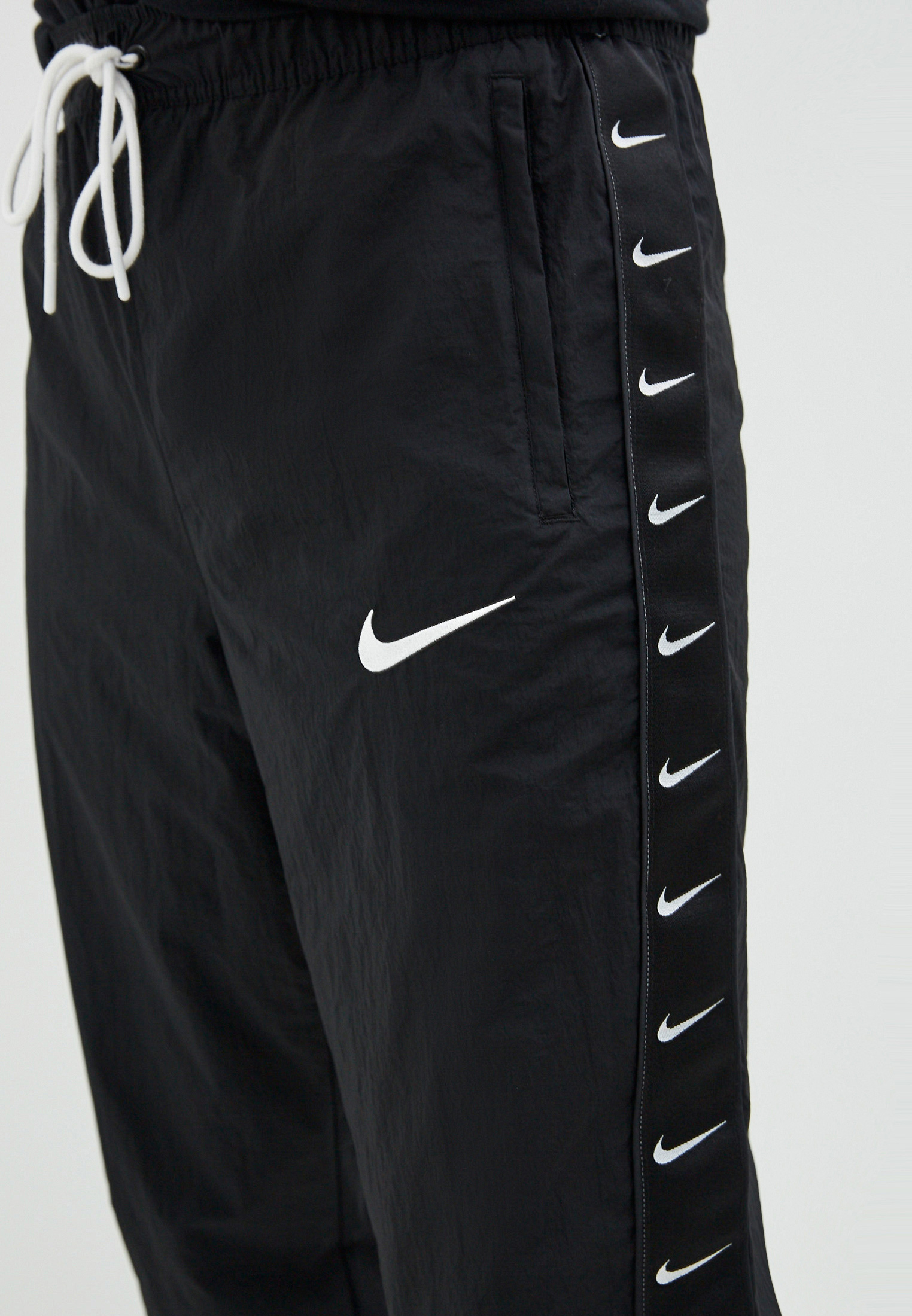 Nike woven swoosh pant sale