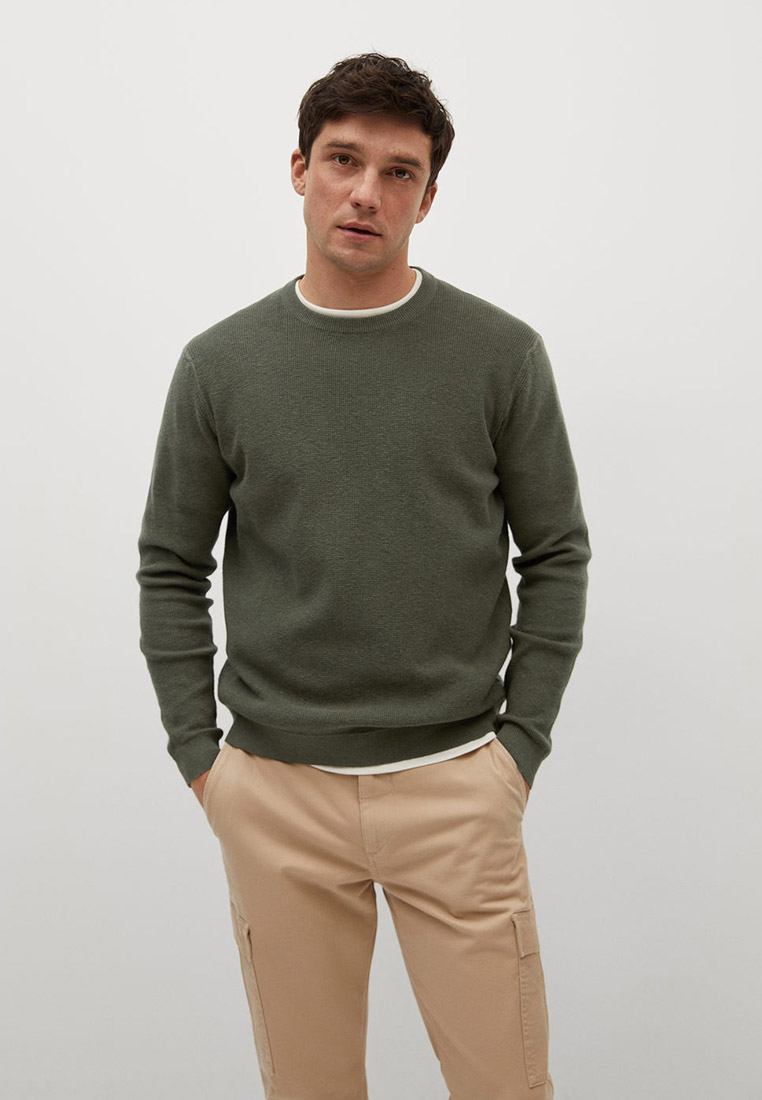 green sweater khaki pants