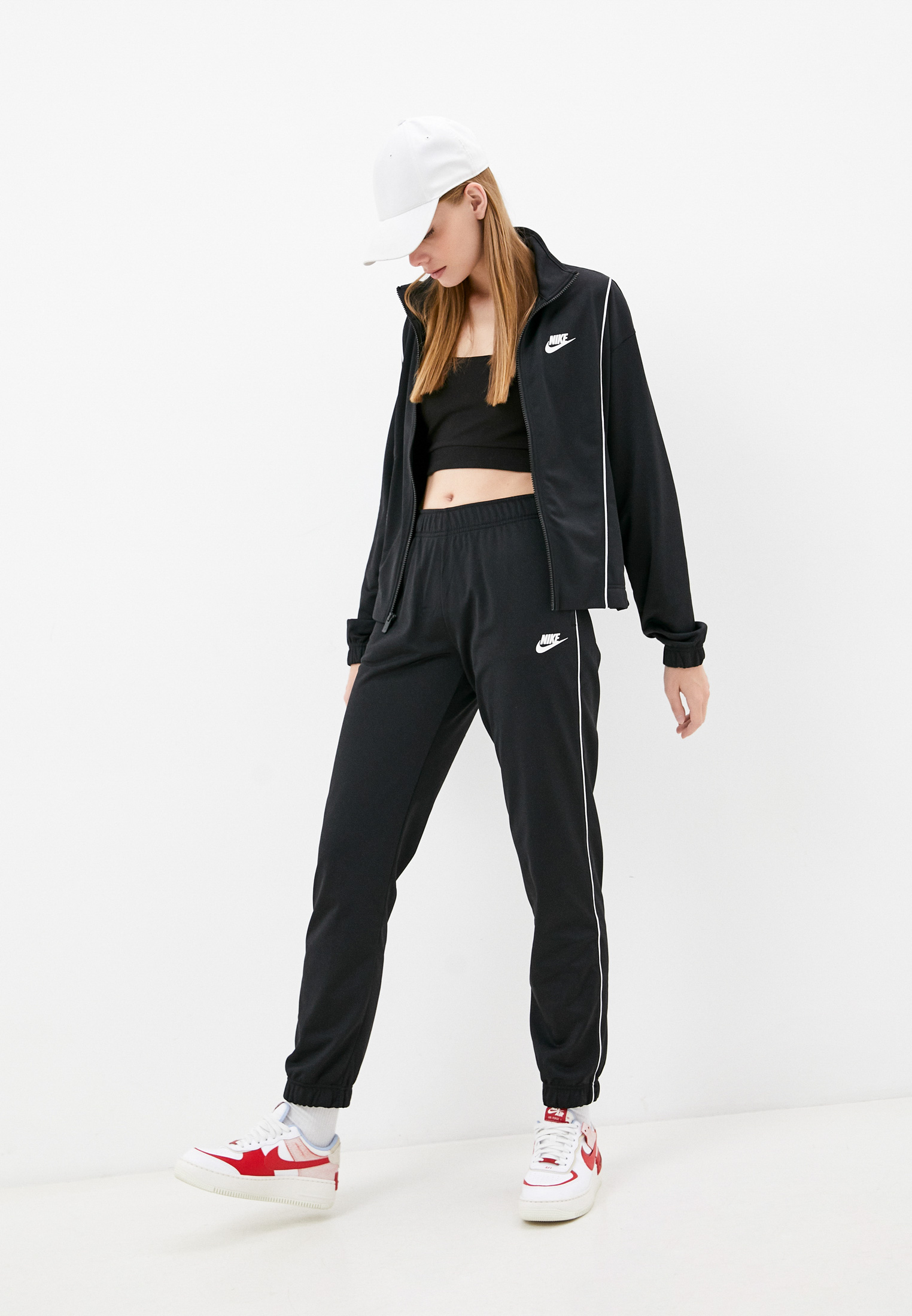 Костюм спортивный Nike W NSW ESSNTL PQE TRK SUIT, цвет: черный,  RTLAAO549401 — купить в интернет-магазине Lamoda